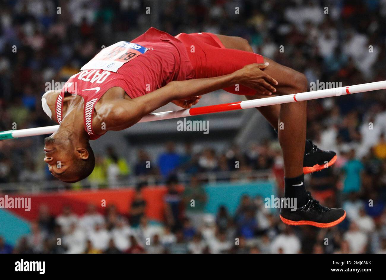 Mutaz Essa Barshim, of Qatar, competes in the men's high jump final at the World Athletics Championships in Doha, Qatar, Friday, Oct. 4, 2019. (AP Photo/Hassan Ammar) Stockfoto