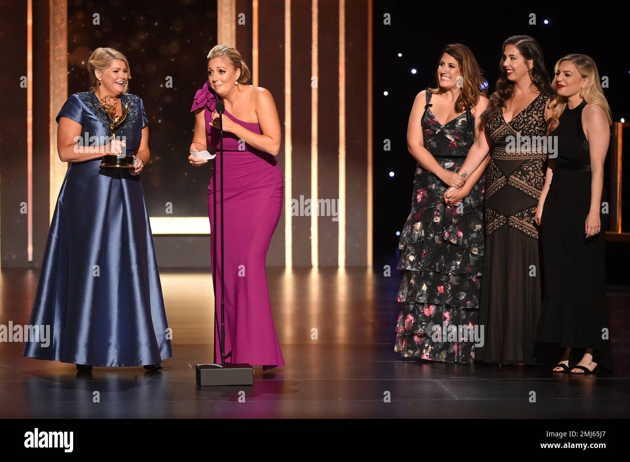 EXCLUSIVE - Gretchen Palek, and from left, Danielle Gervais and the team of "Queer Eye" accept the award for outstanding casting for a reality program on night one of the Television Academy's 2019 Creative Arts Emmy Awards on Saturday, Sept. 14, 2019, at the Microsoft Theater in Los Angeles. (Photo by Phil McCarten/Invision for the Television Academy/AP Images) Stockfoto