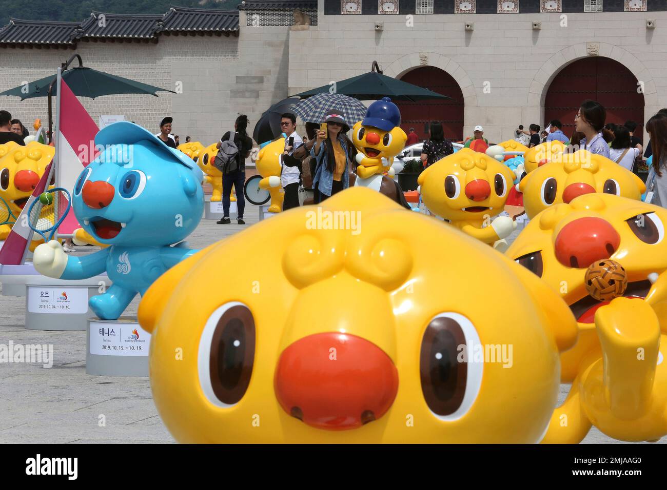 mascots-of-the-national-sports-festival-are-displayed-in-front-of-the