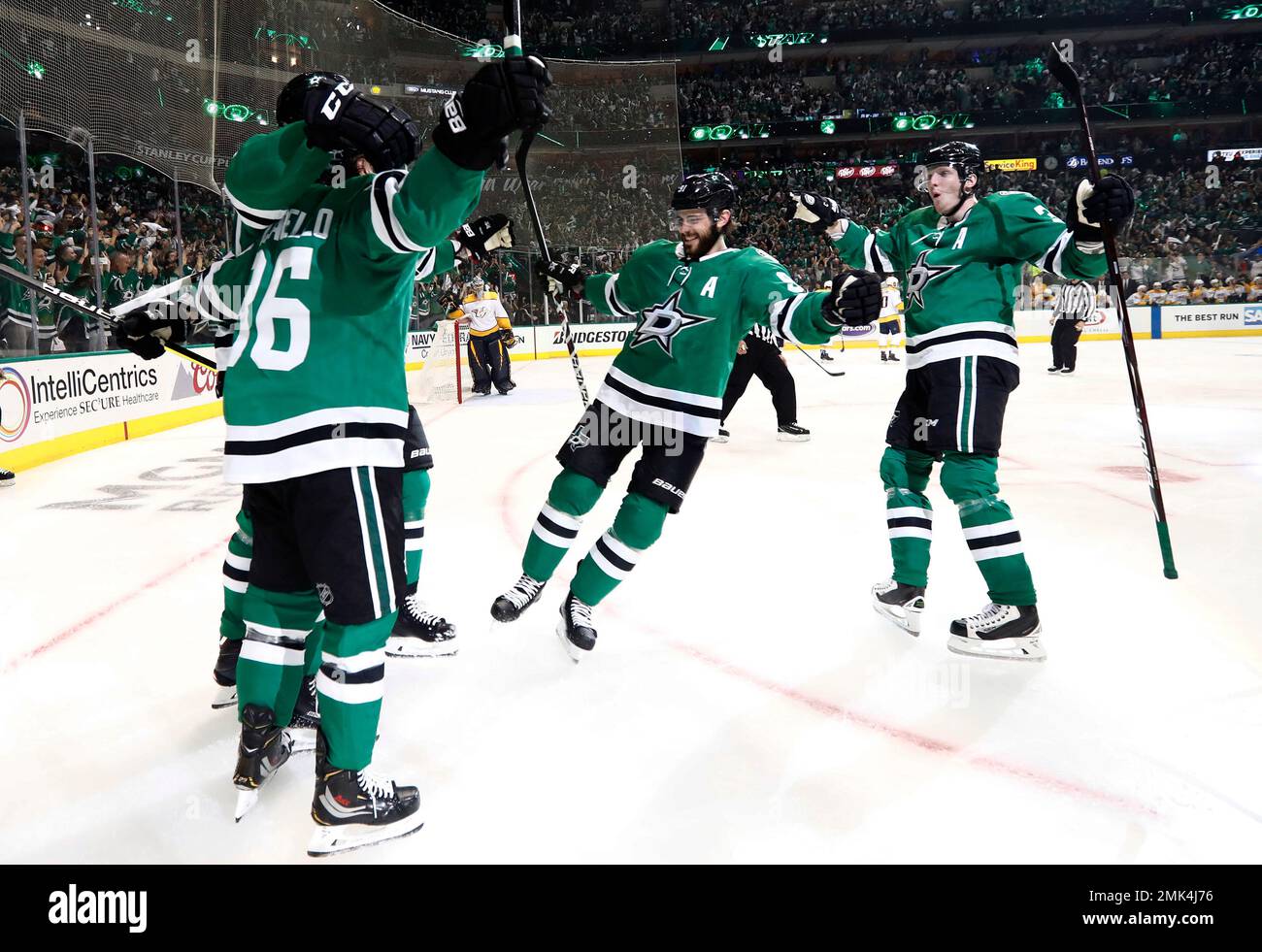 Dallas Stars' Mats Zuccarello (36), Tyler Seguin, center, and John