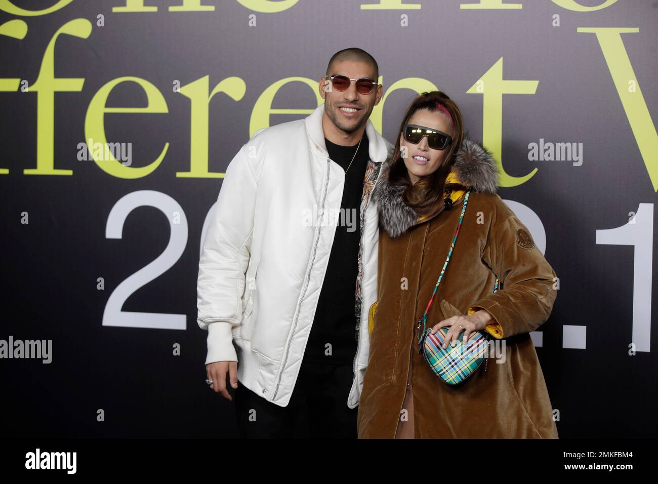 Omar Hassan, Nina Zilli pose during the presentation of the Moncler women's Fall-Winter 2019-2020 fashion collection, that was presented in Milan, Italy, Wednesday, Feb.20, 2019. (AP Photo/Luca Bruno) Stockfoto