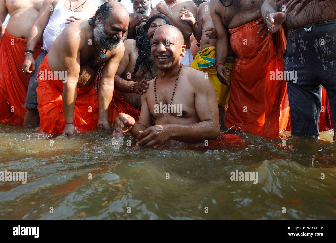 Chief minister of Uttar Pradesh state Yogi Adityanath takes a holy dip ...