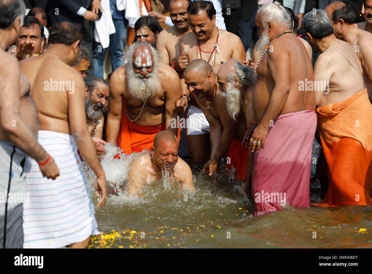 Chief minister of Uttar Pradesh state Yogi Adityanath takes a holy dip ...
