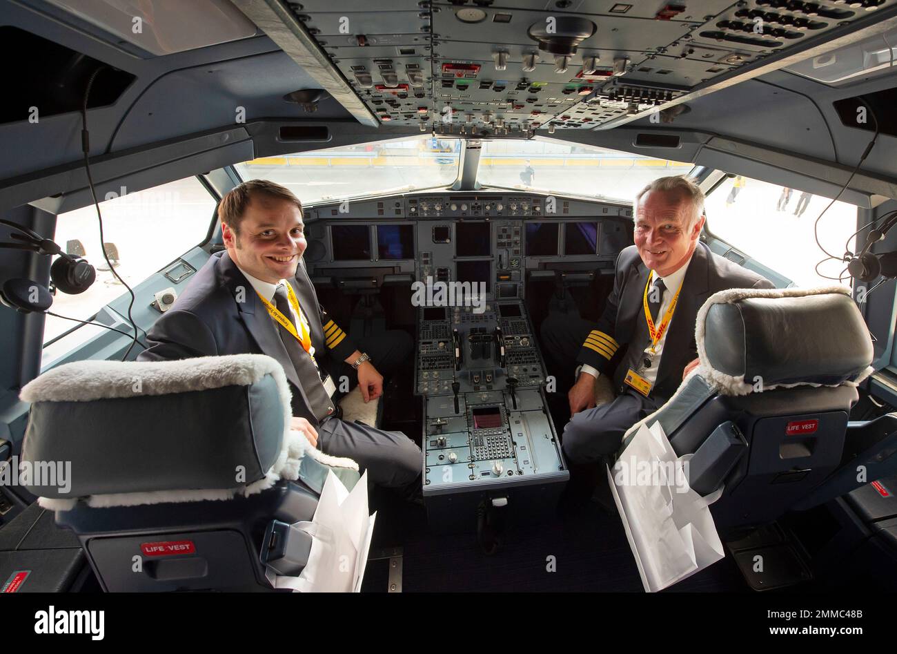 The pilots Christoph Hofmann, left, and Jochen Timm, right, sit in the