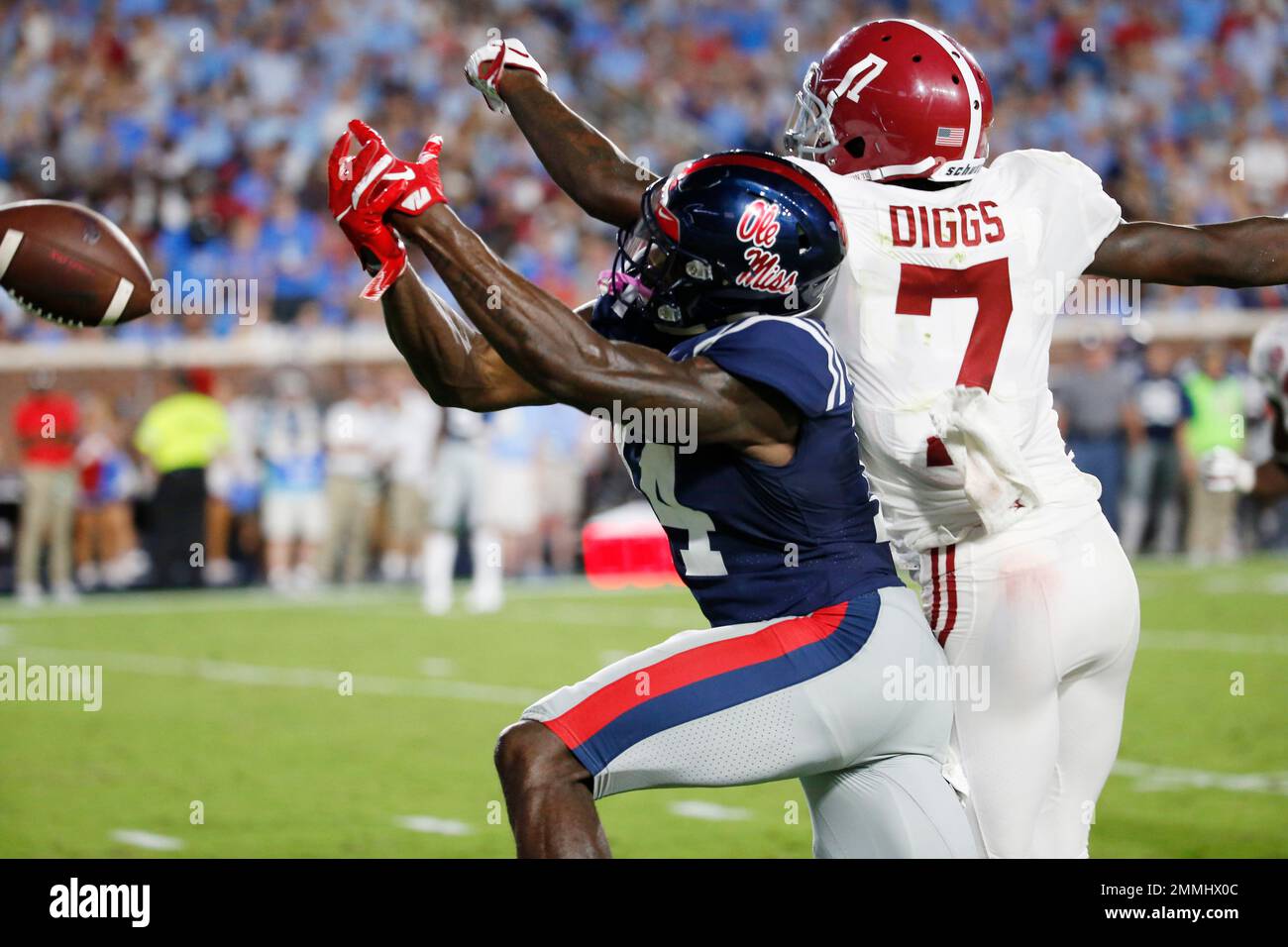 Alabama defensive back Trevon Diggs (7) knocks away a pass intended for Mississippi wide receiver D.K. Metcalf (14) during the first half of their NCAA college football game, Saturday, Sept. 15, 2018, in Oxford, Miss. (AP Photo/Rogelio V. Solis) Stockfoto