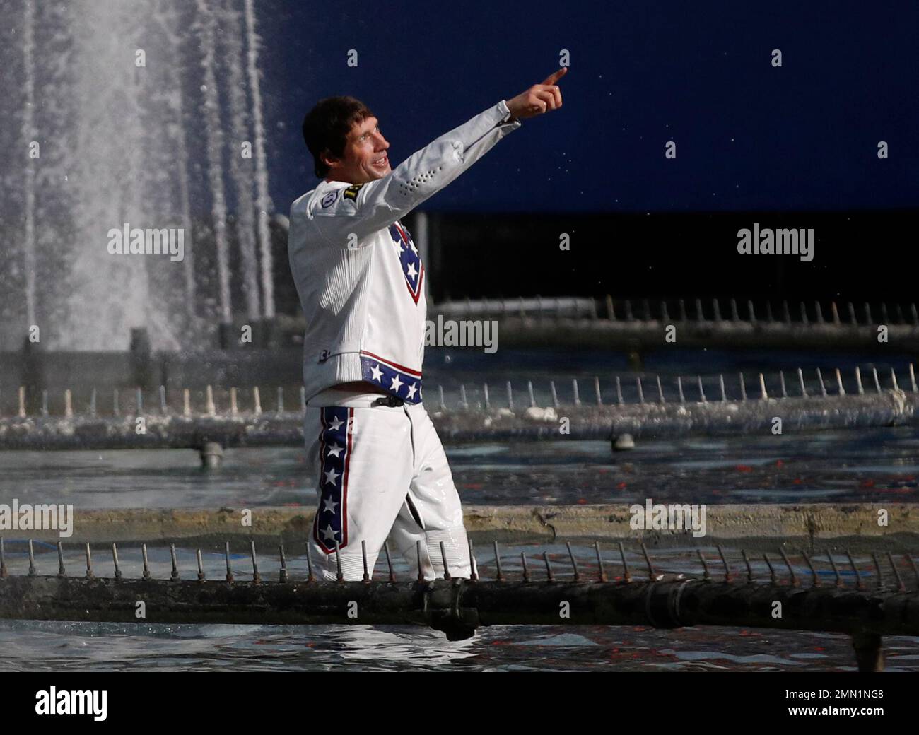 Travis Pastrana celebrates in the fountain at Caesars Palace after ...