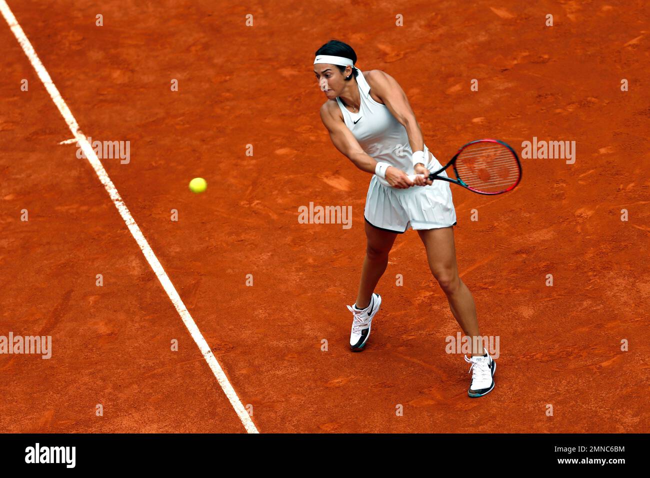 Caroline Garcia from France hits a backhand return to Kiki Bertens from The Netherlands during a Madrid Open tennis tournament semi final match in Madrid, Spain, Friday, May 11, 2018. (AP Photo/Francisco Seco) Stockfoto