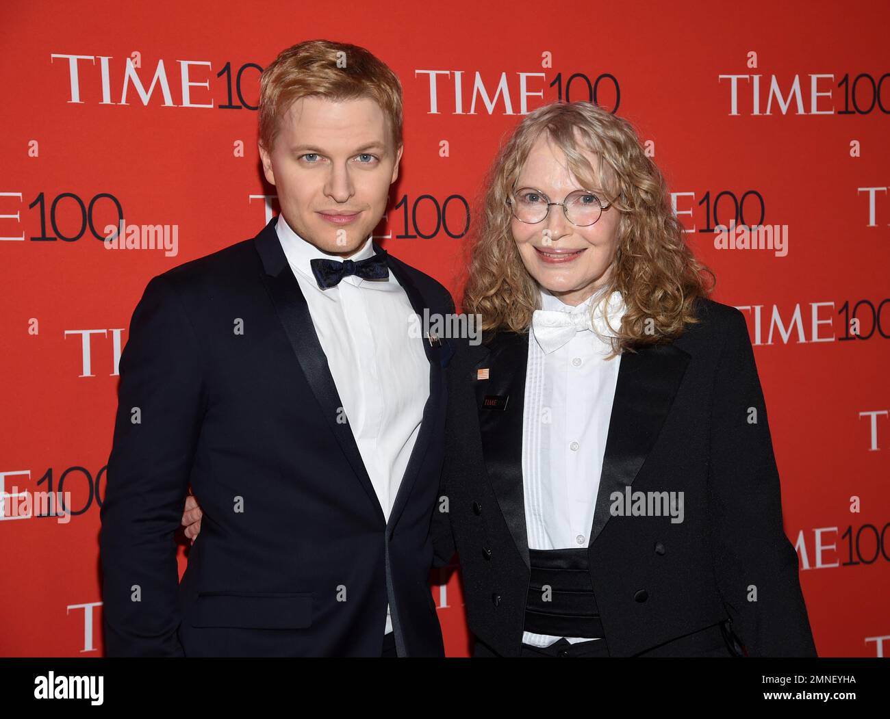 Journalist Ronan Farrow, left, and his mother Mia Farrow attend the