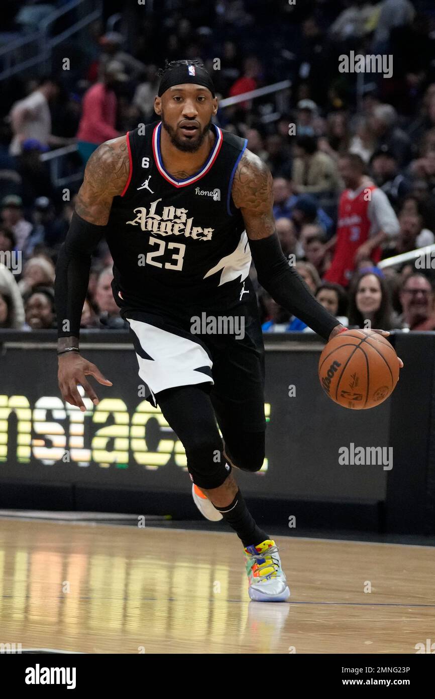 Los Angeles Clippers forward Robert Covington (23) controls the ball during an NBA basketball game against the San Antonio Spurs in Los Angeles, Thursday, Jan. 26, 2023. (AP Photo/Ashley Landis) Stockfoto