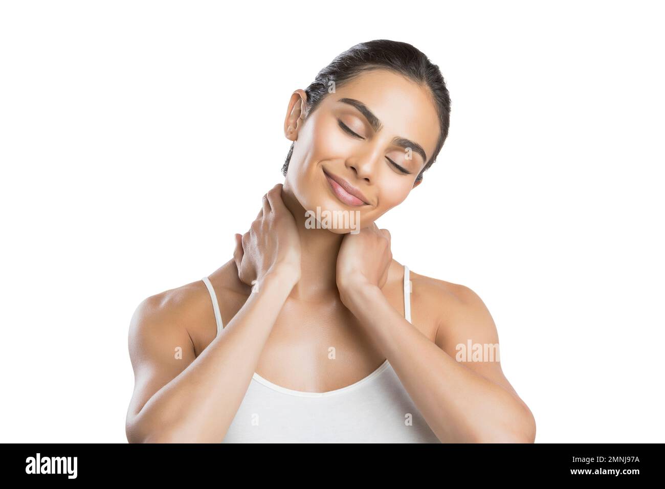 Porträt einer jungen Frau, die eine Nackenmassage macht Stockfoto
