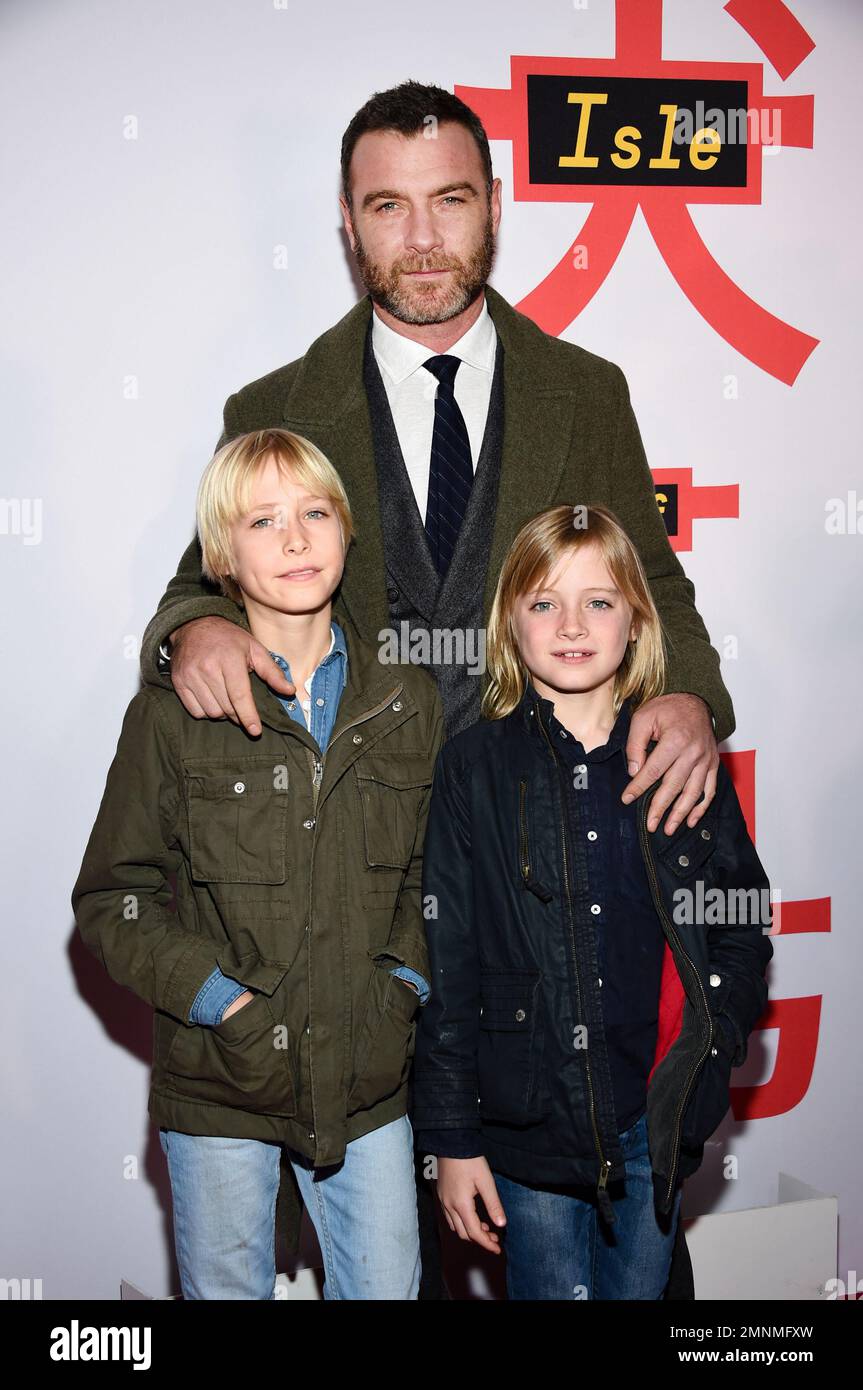 Actor Liev Schreiber, in background, and his sons, from left, Alexander