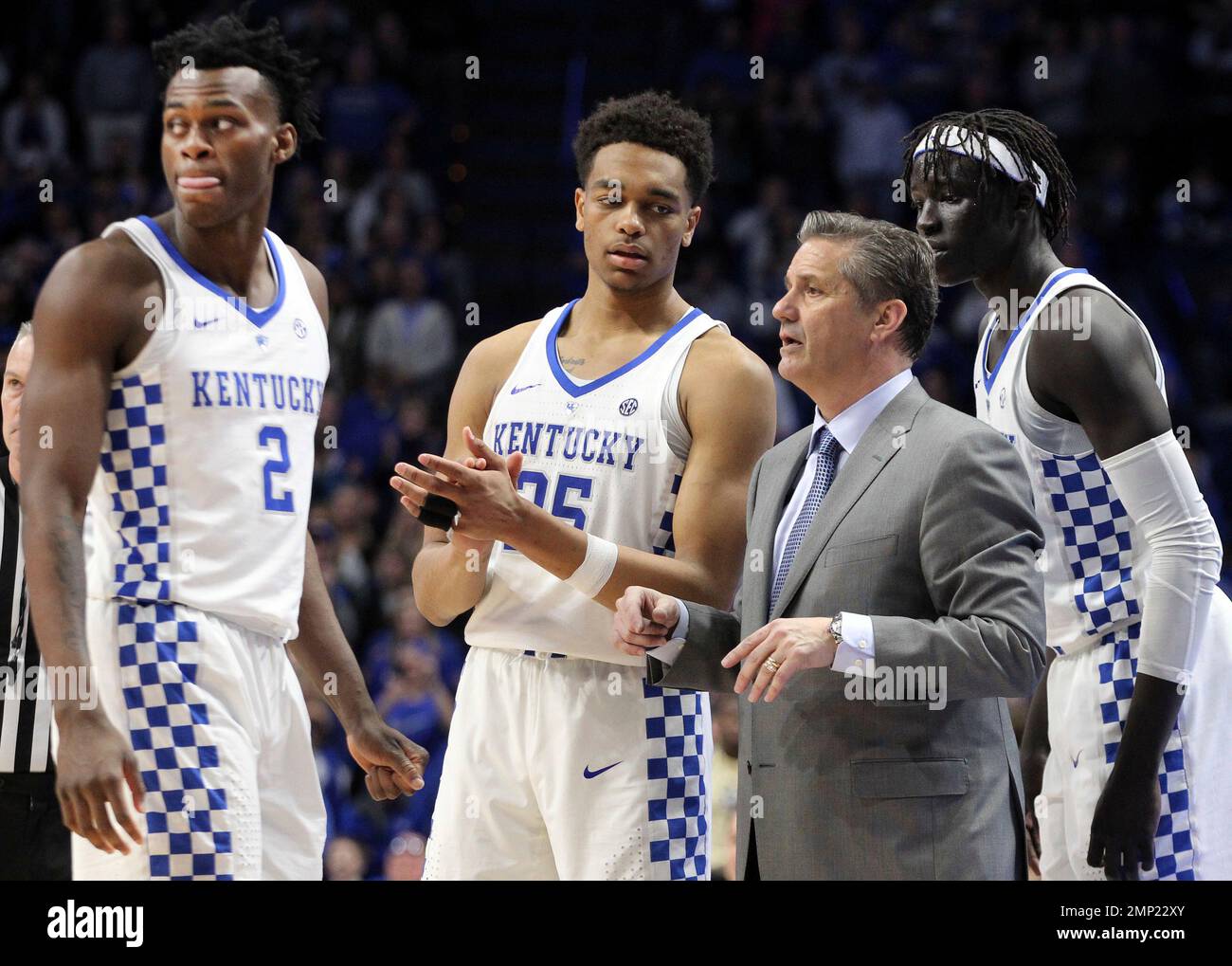 Kentucky's Jarred Vanderbilt, PJ Washington, coach John Calipari and