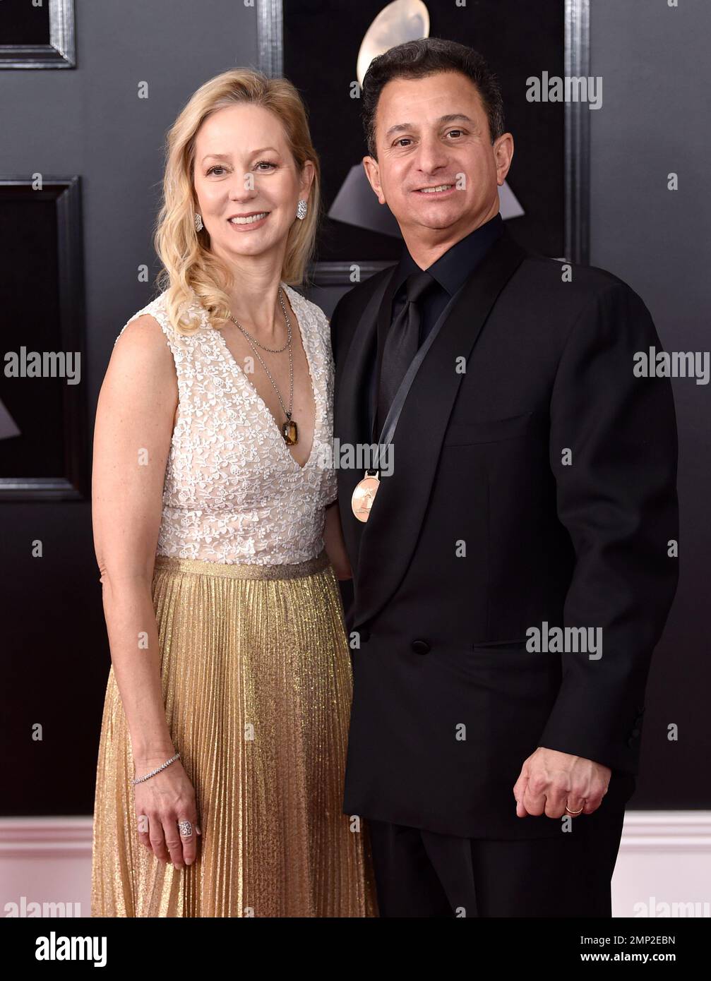 Jerry Longarzo, right, and Diana Longarzo arrive at the 60th annual Grammy Awards at Madison Square Garden on Sunday, Jan. 28, 2018, in New York. (Photo by Evan Agostini/Invision/AP) Stockfoto