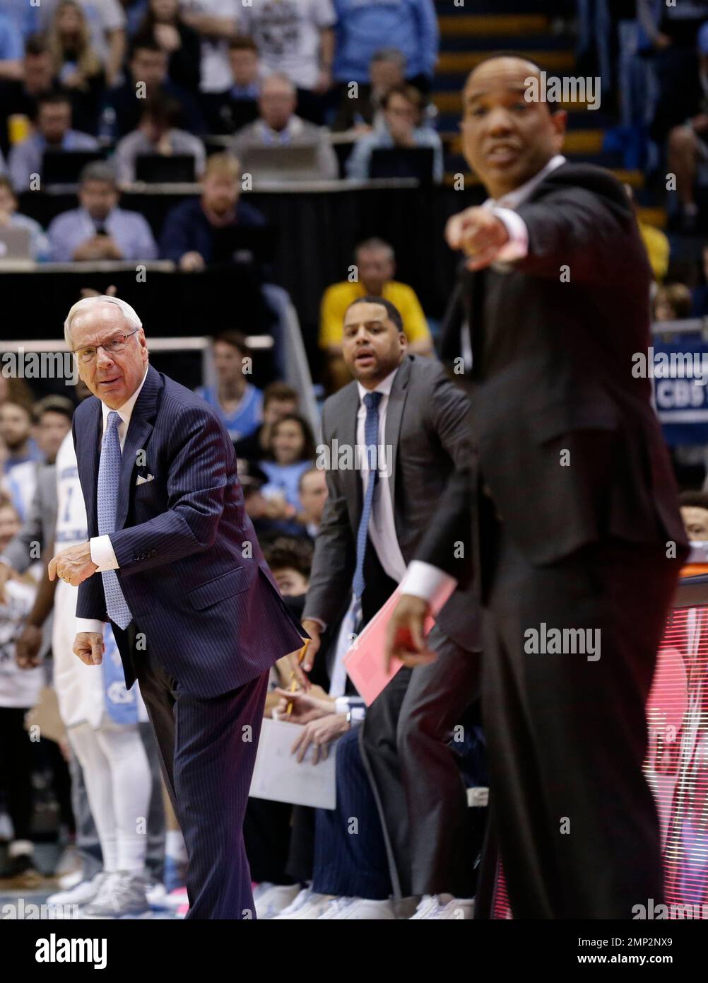North Carolina head coach Roy Williams, left, and North Carolina State