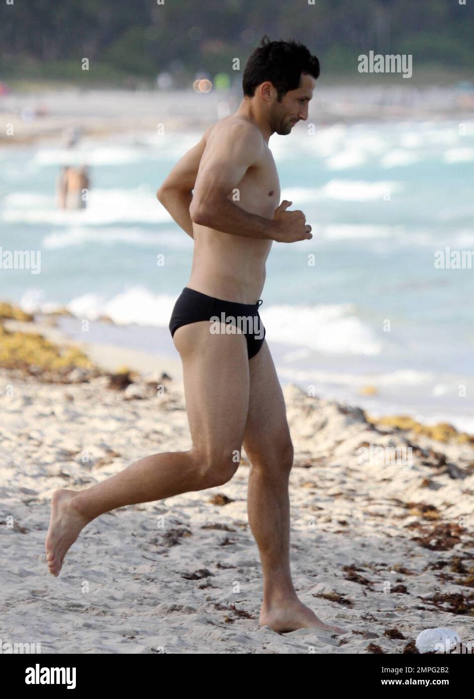 Hasan 'Brazzo' Salihamidzic und Familie verbringen einen Tag am Strand während ihres Urlaubs in Miami, FL. 6/1/11. Stockfoto