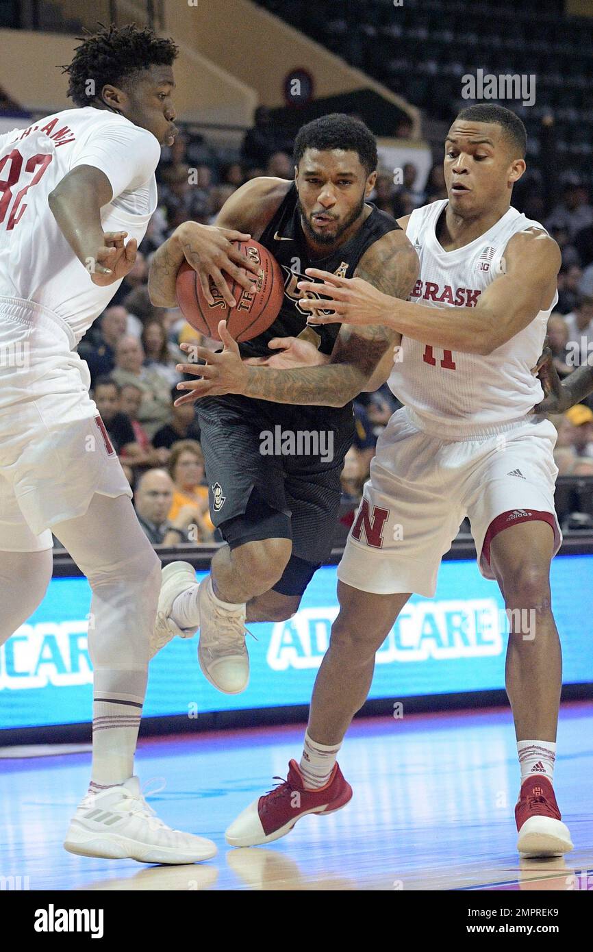 Central Florida guard Ceasar DeJesus (4) drives to the basket between