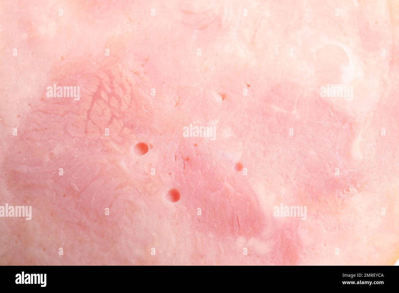 Leckerer Schinken als Hintergrund, Nahaufnahme. Frische Delikatesse Stockfoto