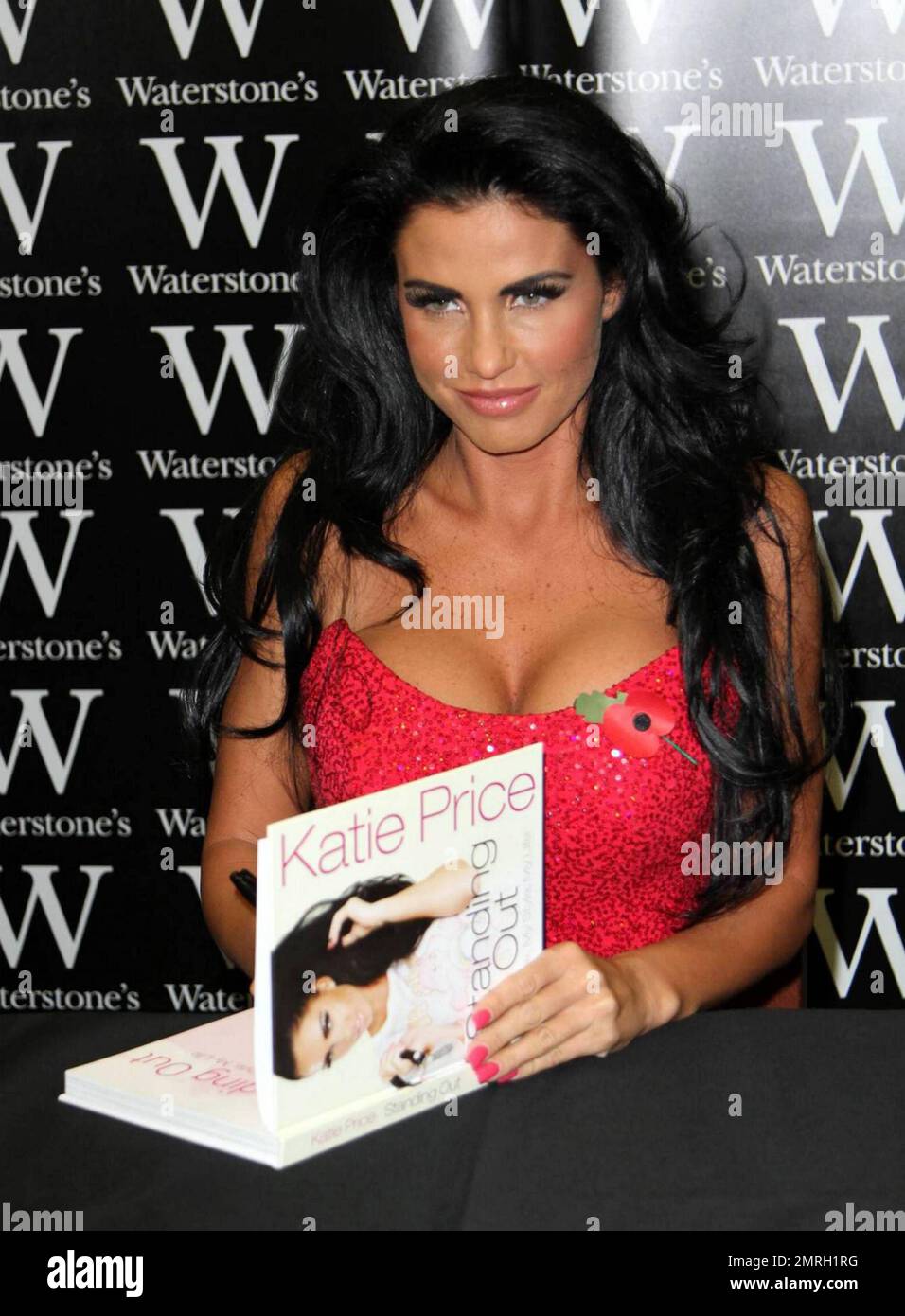 Katie Price (alias Jordan) und ihr Freund Alex Reid nehmen an einer Buchsignierung bei Waterstone's für Katies neues Buch „herausragend“ in London Teil. 11/7/09. Stockfoto