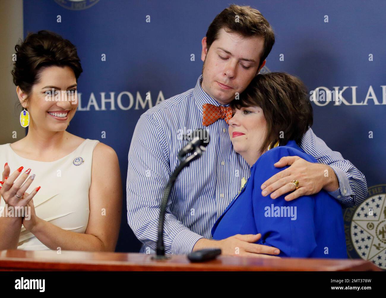 Cathy Costello, right, the widow of slain Oklahoma Labor Commissioner(00)