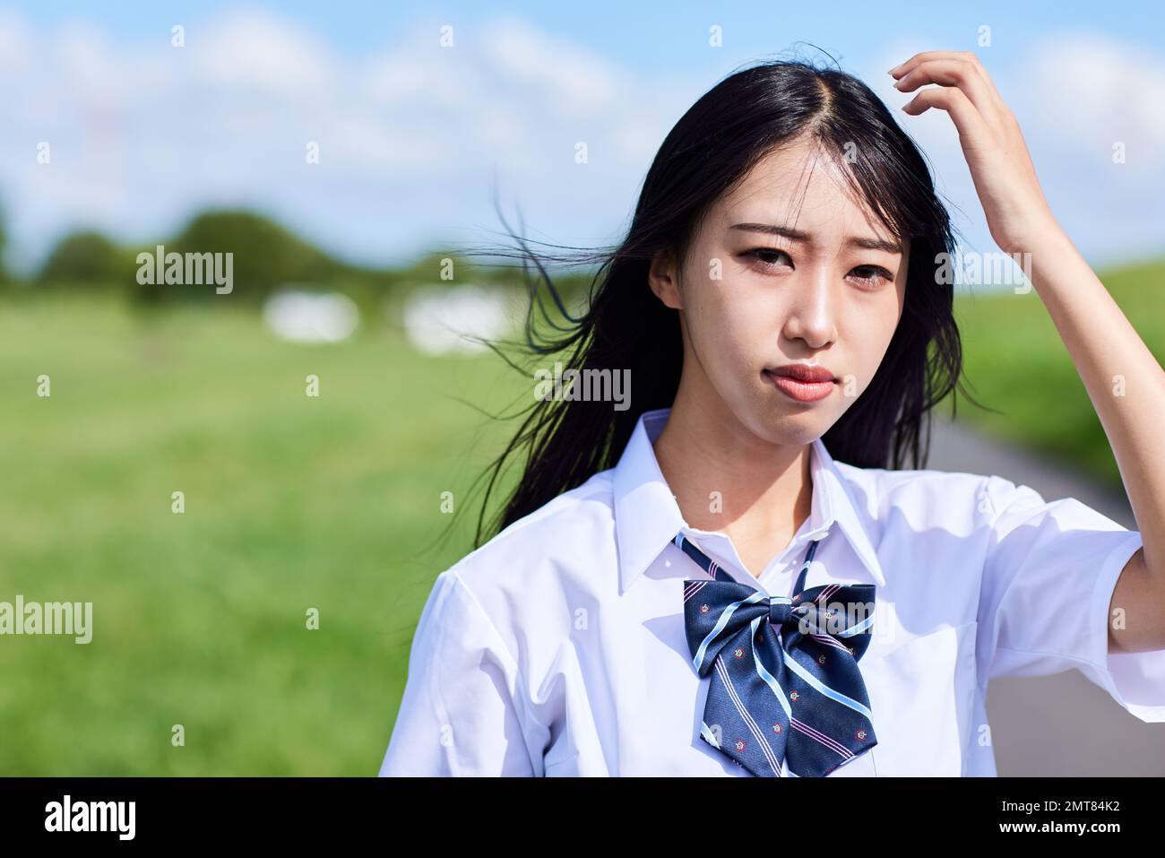 Japanische Highschool-Schüler Porträt im Freien Stockfoto