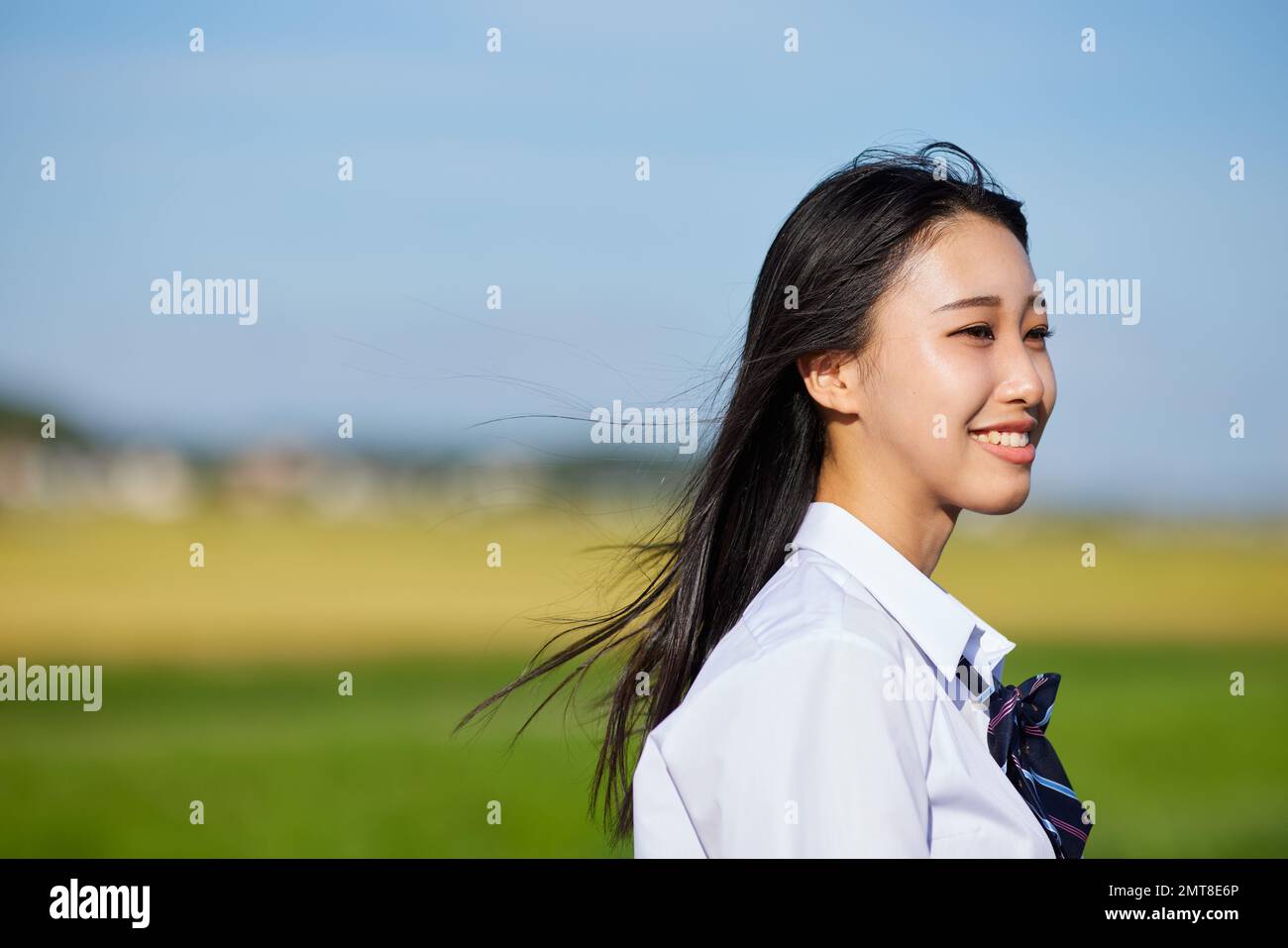 Japanische Highschool-Schüler Porträt im Freien Stockfoto