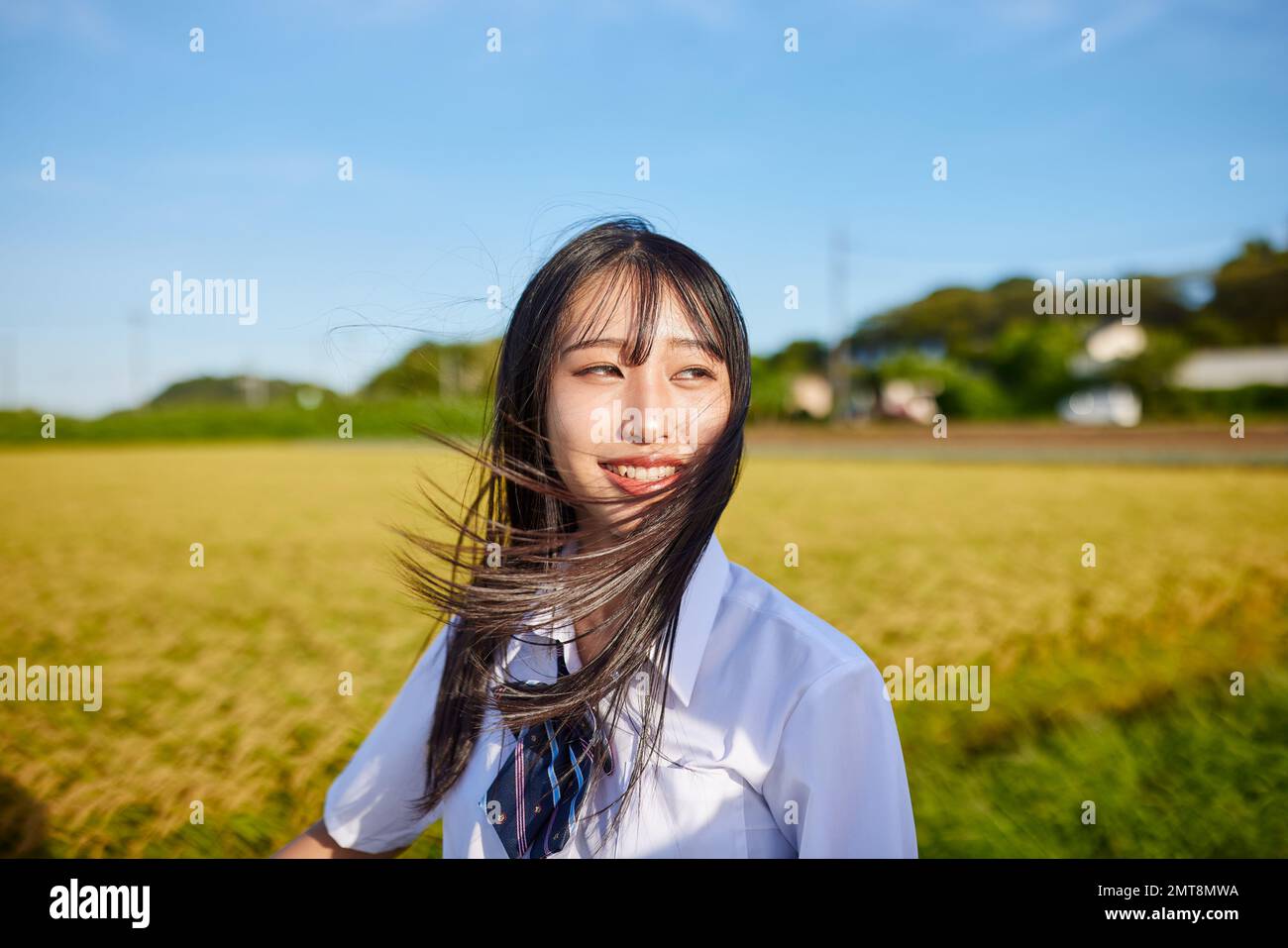 Japanische Highschool-Schüler Porträt im Freien Stockfoto