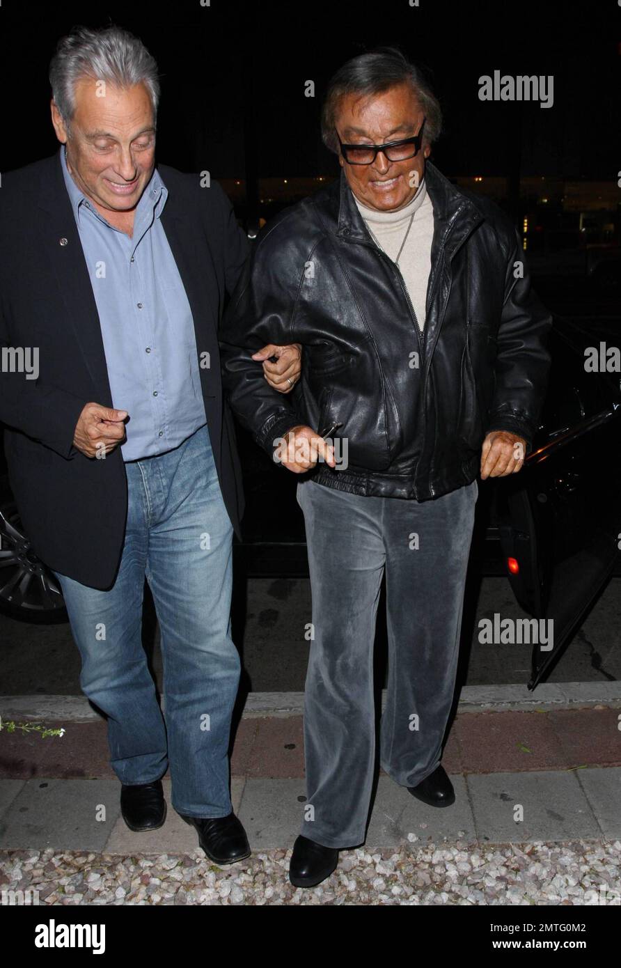 Robert Evans, Produzent von Chinatown, trägt graue Leichtathletikhosen