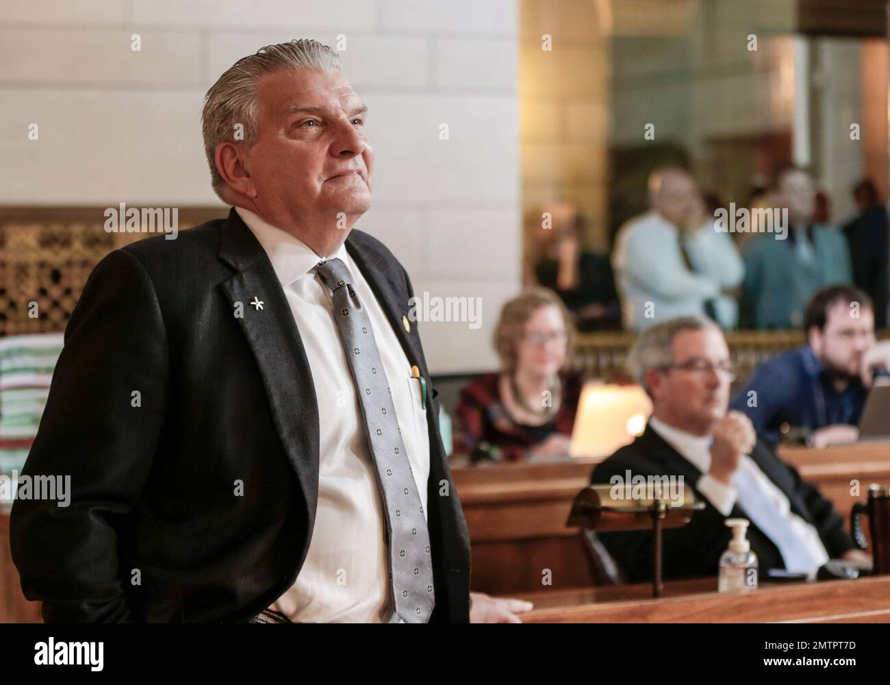 Neb. state Sen. John Stinner of Gering follows the vote on his veto