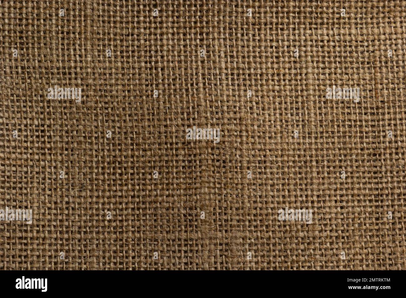 Sacktuch Textil abstrakte Textur Hellbraun Creme Gelb Beige Erdton. Stockfoto