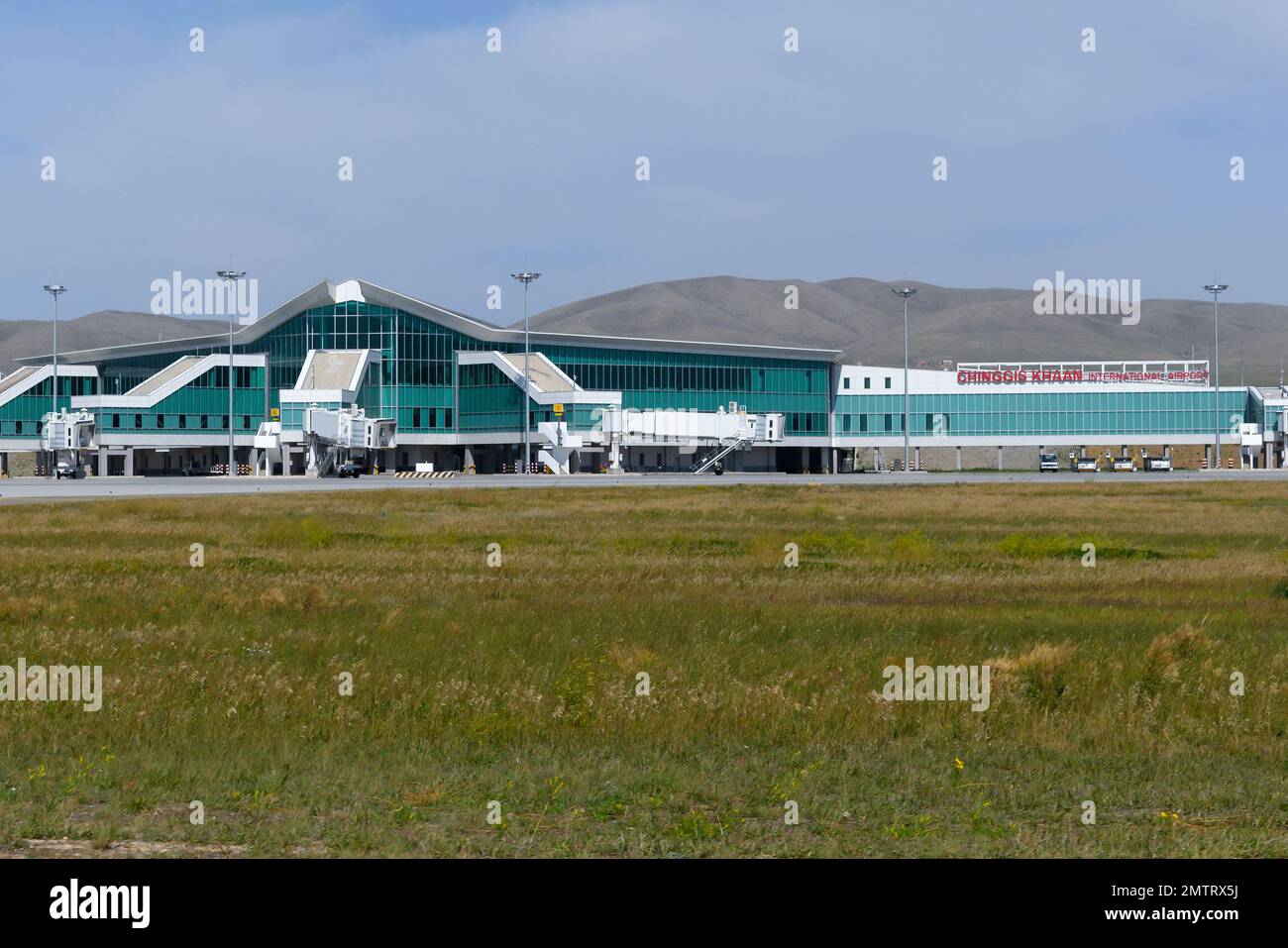 Passagierterminal des internationalen Flughafens New Ulaanbaatar. Flughafen Ulaanbaatar in der Mongolei heißt Chinggis Khaan International Airport. Stockfoto