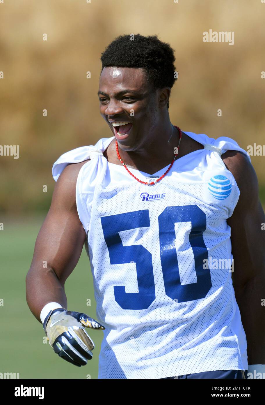 Los Angeles Rams linebacker Samson Ebukam (50) exits the field following the NFL football rookie minicamp at the team's practice facility in Thousand Oaks, Calif., Friday, May 12, 2017. (AP Photo/Michael Owen Baker) Stockfoto