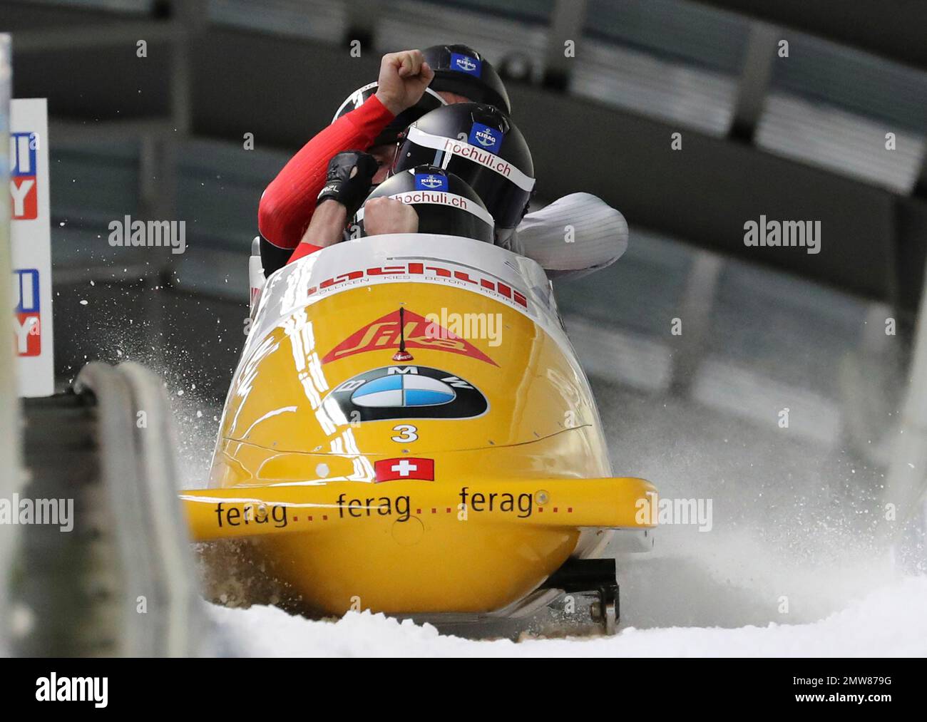 Second placed Switzerland's Rico Peter, front, and his teammates Janne Bror van der Zijde, Alex Baumann and Thomas Amrhein react after the second run of the 4-man Bobsleigh World Cup competition at the Alpensia Sliding Centre in Pyeongchang, South Korea, Sunday, March 19, 2017. (AP Photo/Lee Jin-man) Stockfoto