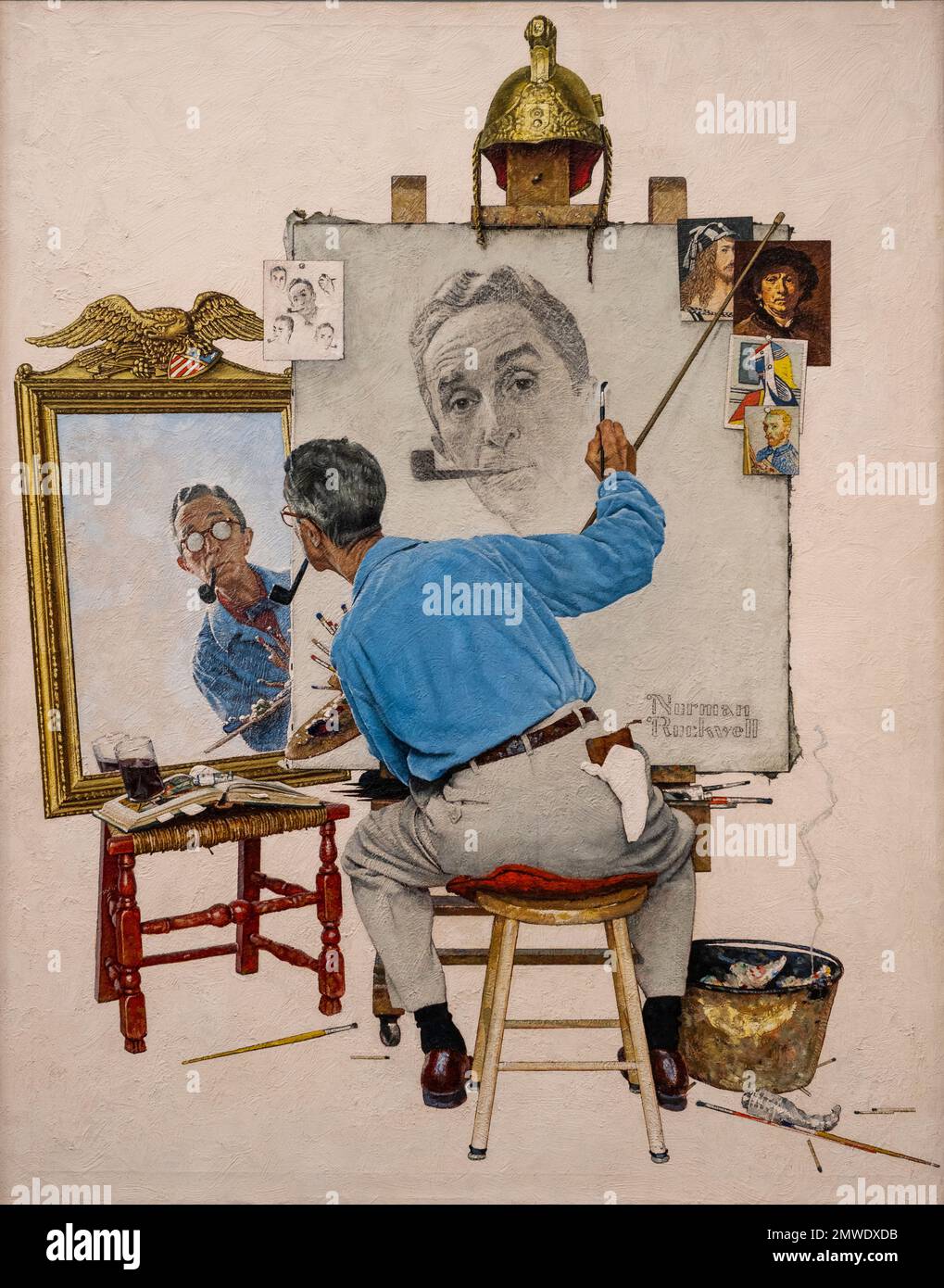 Ein Gemälde namens Triple Self-Portrait, das 1960 von Norman Rockwell in seinem Künstlerstudio gefertigt wurde Stockfoto