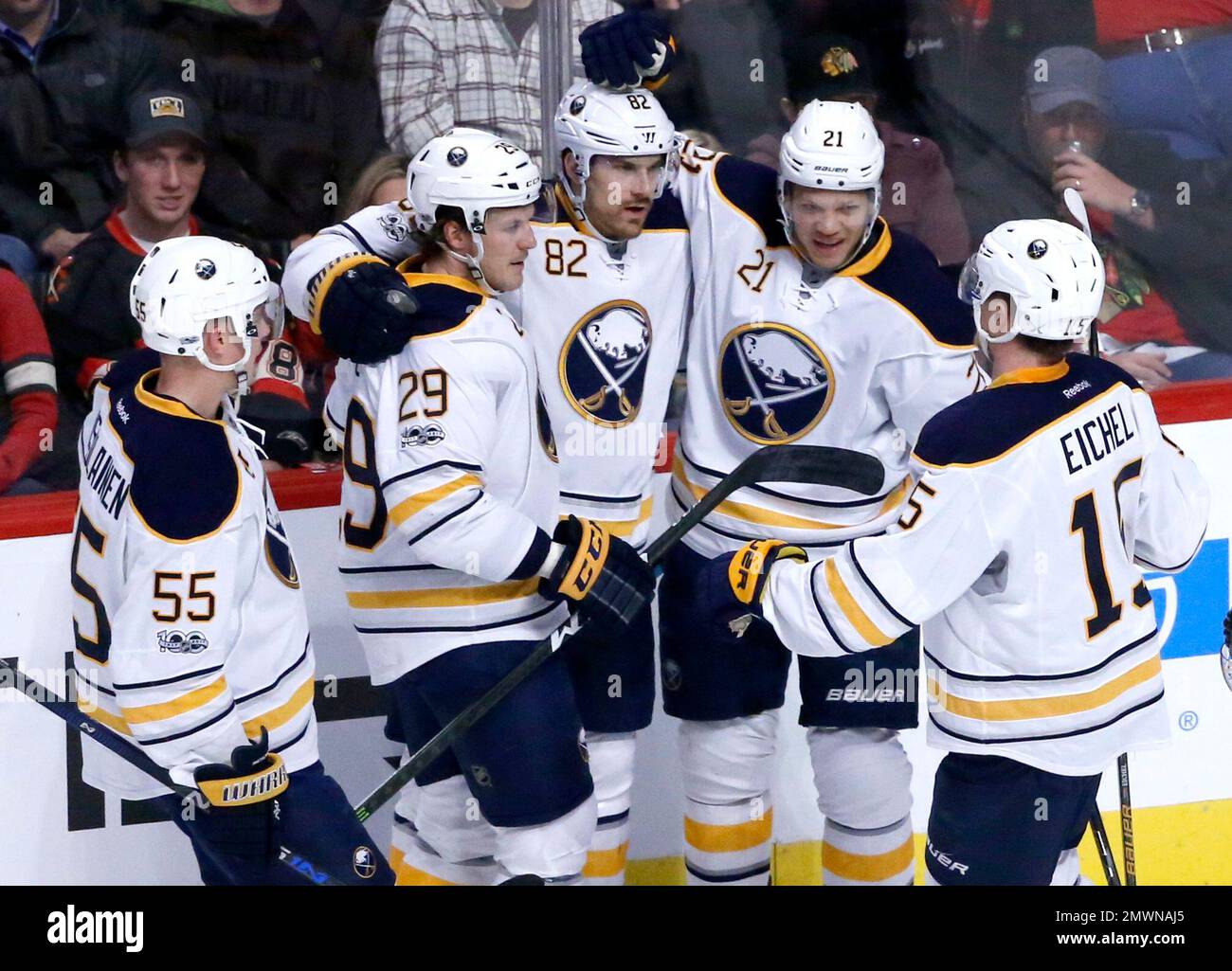 Buffalo Sabres' Marcus Foligno (82) celebrates his goal with teammates during the first period of an NHL hockey game against the Chicago Blackhawks Thursday, Jan. 5, 2017, in Chicago. (AP Photo/Charles Rex Arbogast) Stockfoto