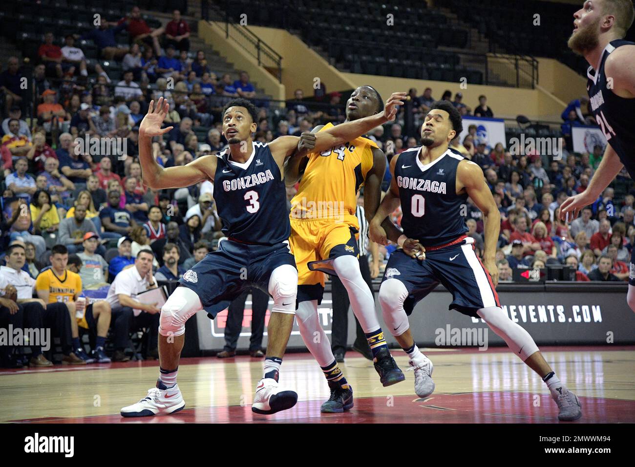 Quinnipiac forward Abdulai Bundu (34) fights for position under the