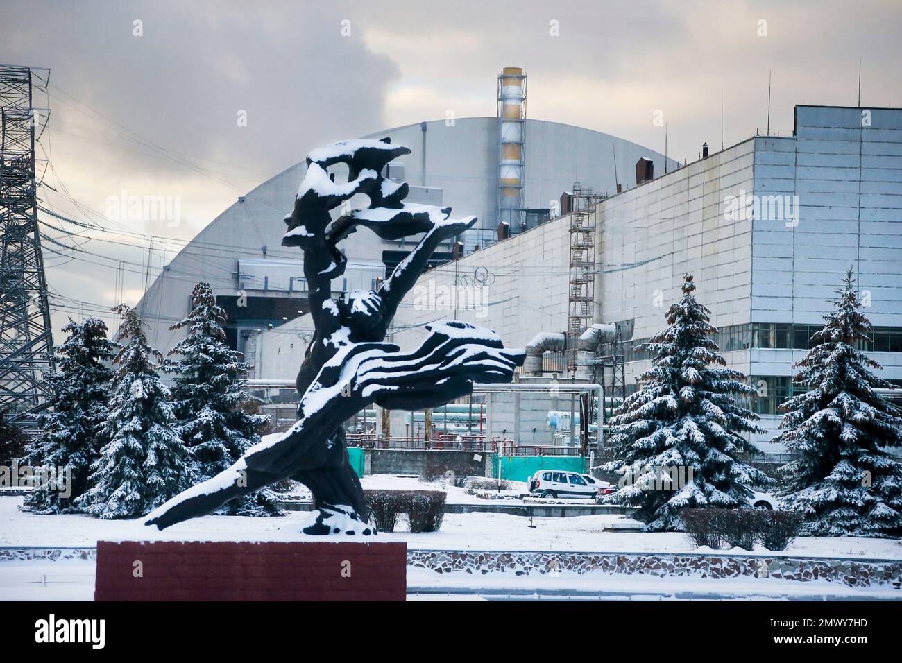 The monument to the victims of the Chernobyl tragedy is in front of a ...