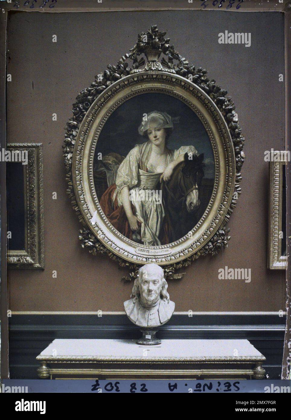 Paris (1. Arr.), Frankreich La Laitière de Greuze und die Büste von Benjamin Franklin by Houdon, Louvre Museum, Stockfoto