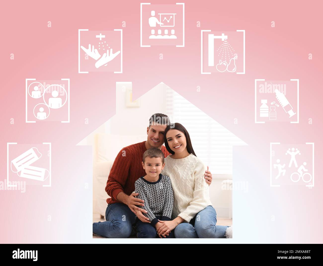 Coronavirus-Präventionskonzept. Glückliche Familie zu Hause Stockfoto