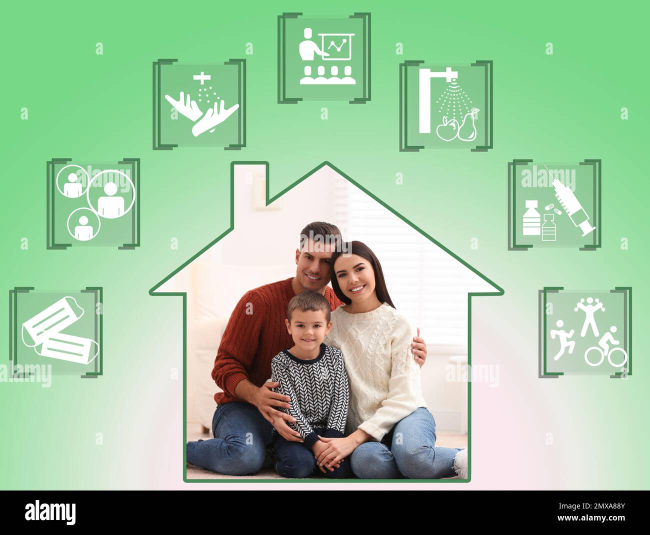 Coronavirus-Präventionskonzept. Glückliche Familie zu Hause Stockfoto