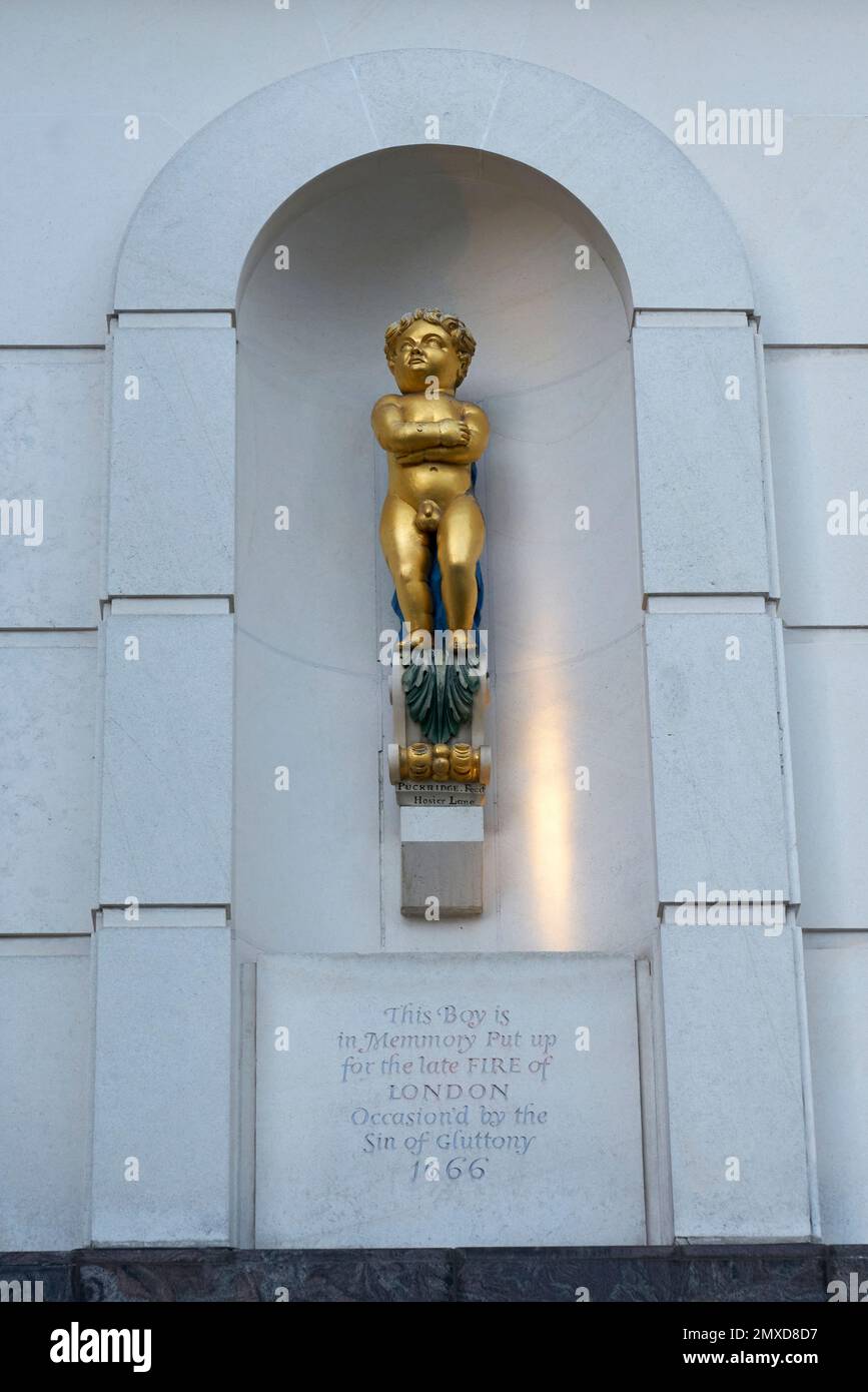 Golden-Boy-Statue-Kuchenecke Stockfoto