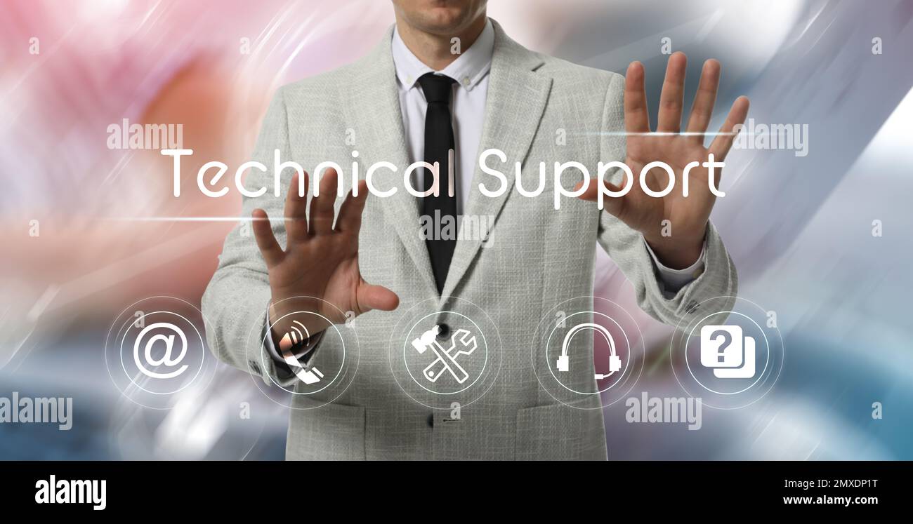 Geschäftsmann, der einen virtuellen Bildschirm mit verschiedenen Symbolen verwendet, Nahaufnahme. Technischer Support Stockfoto