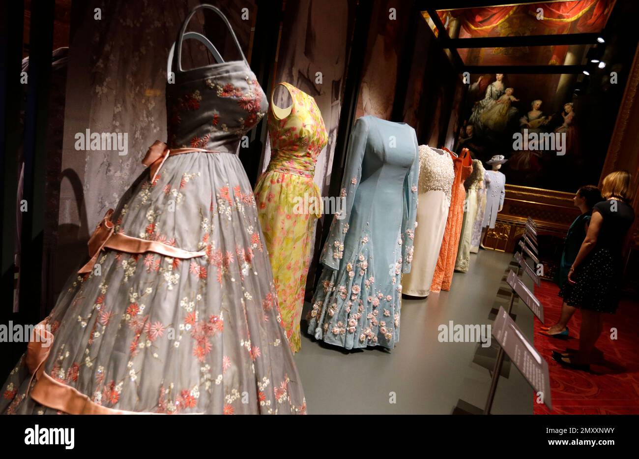 A selection of evening dresses worn by Britain's Queen Elizabeth II on