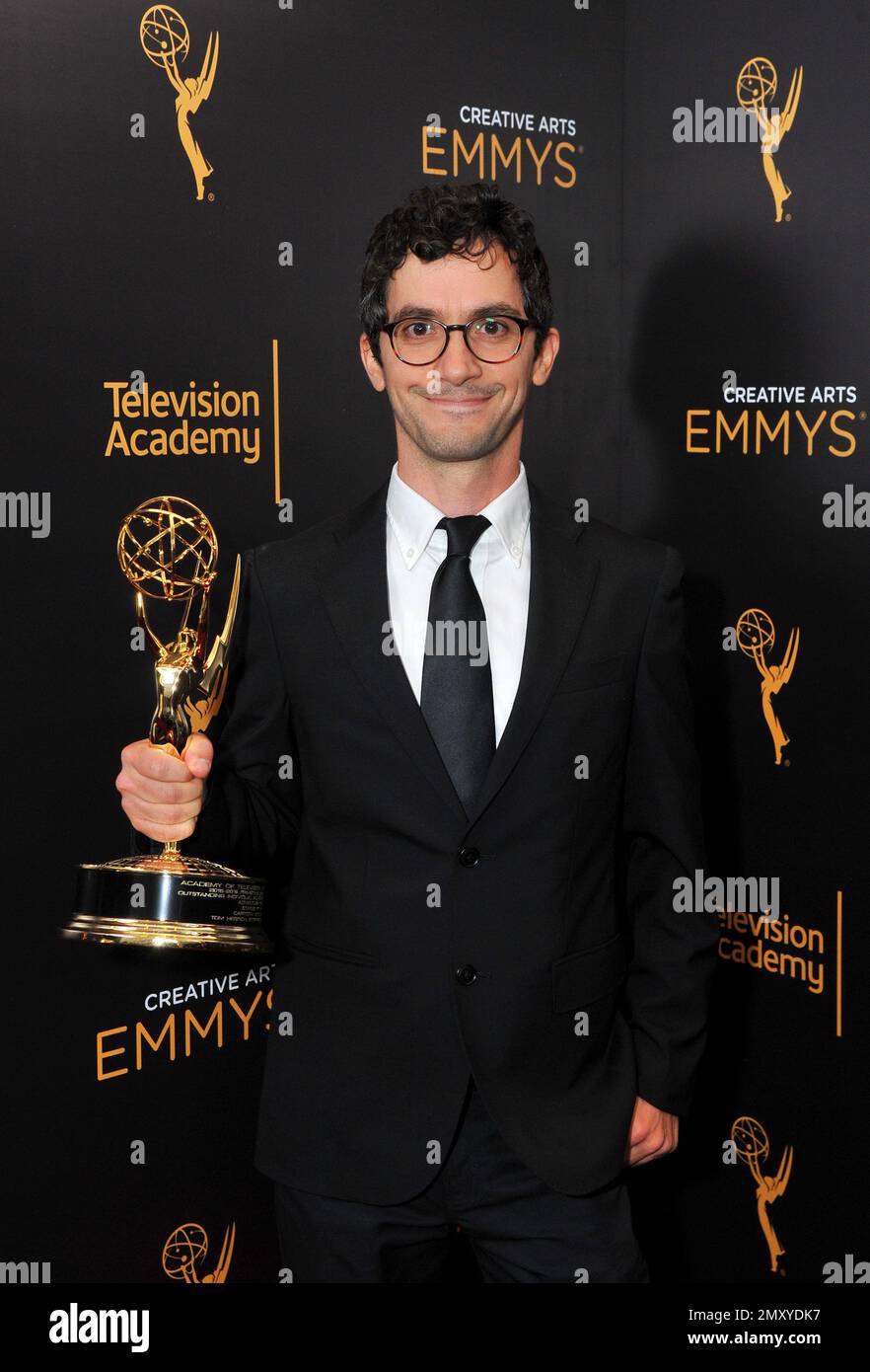 EXCLUSIVE - Tom Herpich poses for a portrait with the award for outstanding individual achievement in animation for outstanding individual achievement in animation for "Adventure Time - Stakes Pt. 8: The Dark Cloud" during night two of the Television Academy's 2016 Creative Arts Emmy Awards at the Microsoft Theater on Sunday, Sept. 11, 2016 in Los Angeles. (Photo by Vince Bucci/Invision for the Television Academy/AP Images) Stockfoto