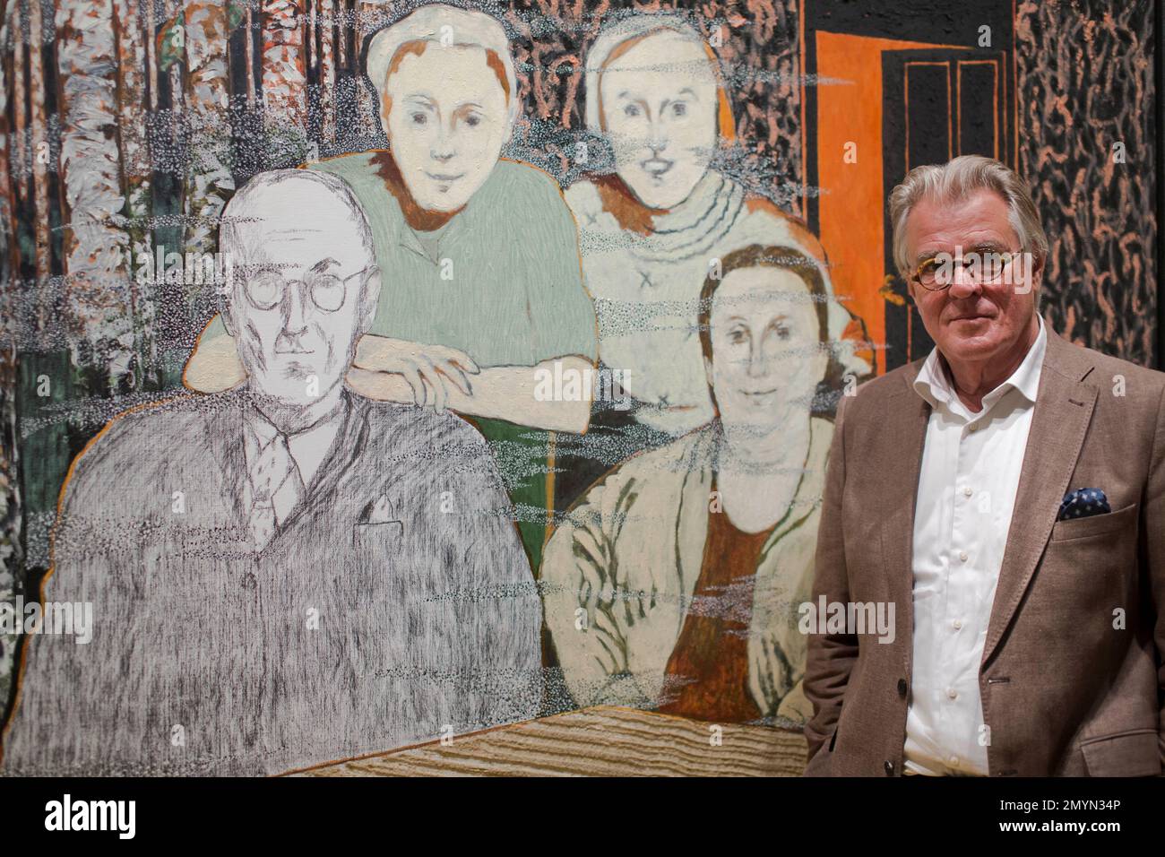 Dutch actor and artist Jeroen Krabbe poses in front of his painting ...