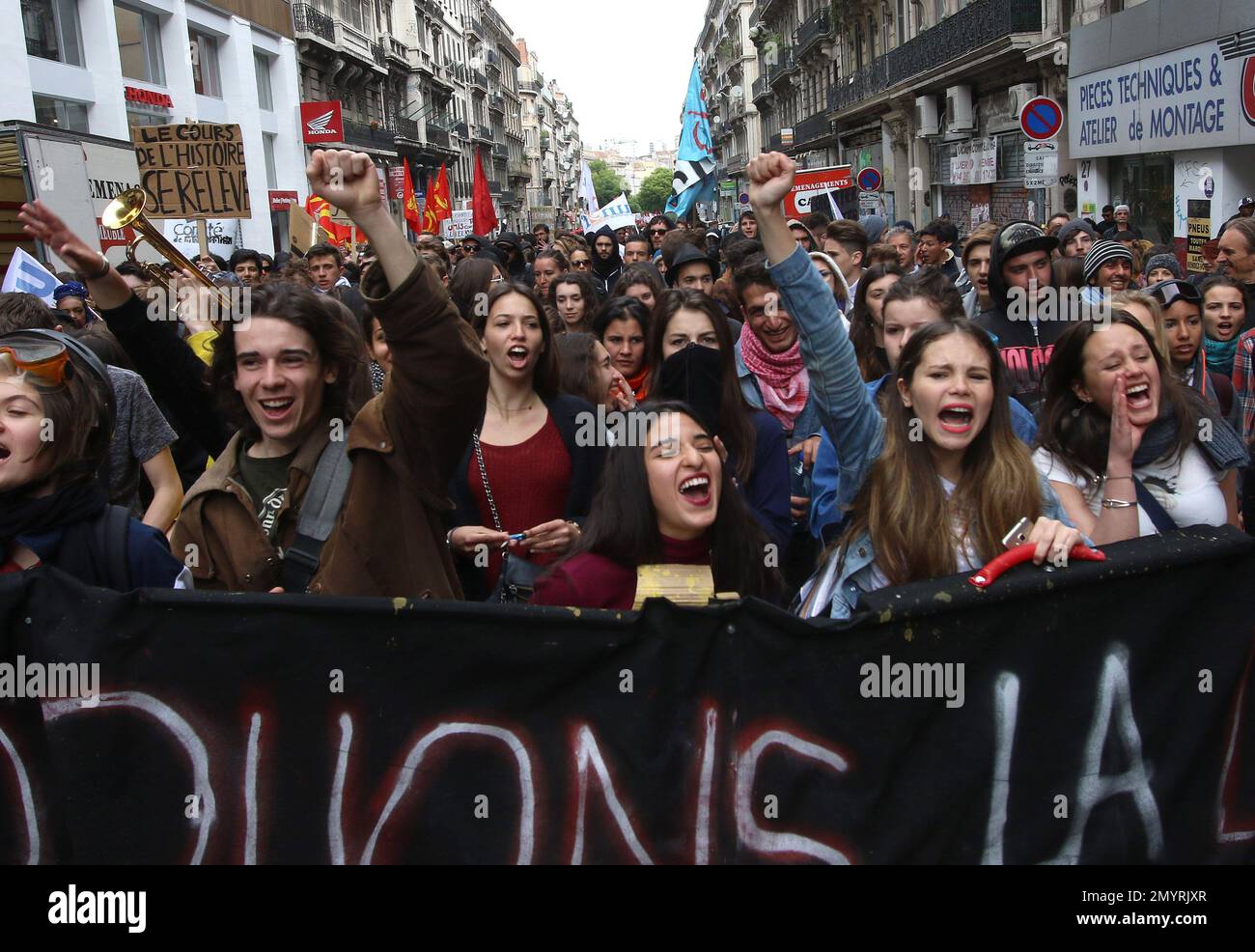 Students shout slogans during a demonstration in Marseille, southern