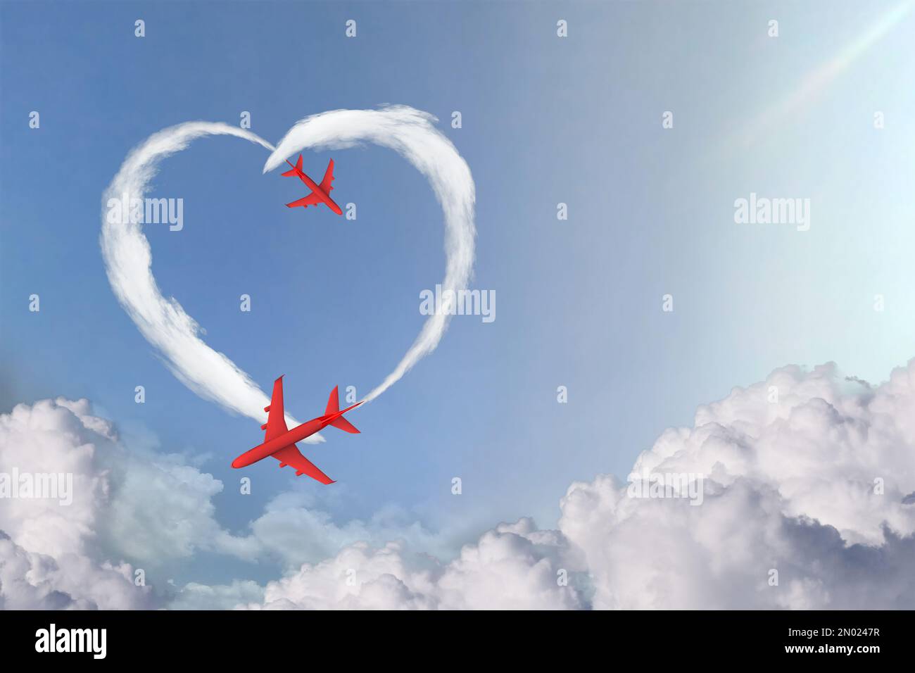 Valentinswoche, besondere Illustrationsidee. Flugzeuge machen aus Rauchwolken am Himmel Herzform. Stockfoto