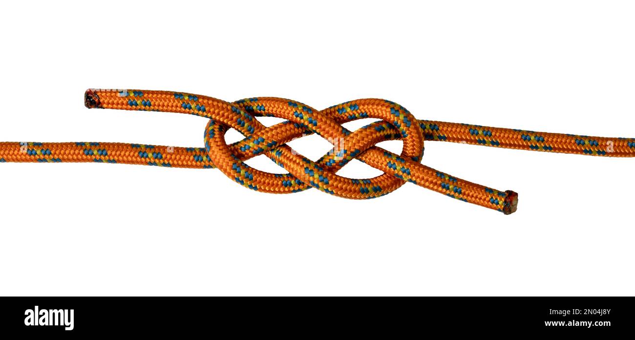 Beispiel für ein orangefarbenes Seil mit Banner- oder carrick-Biegeknoten, weißen Hintergrund isolieren Stockfoto