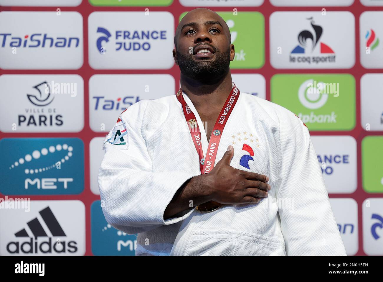 France's Teddy Riner celebrates with his gold medal after winning