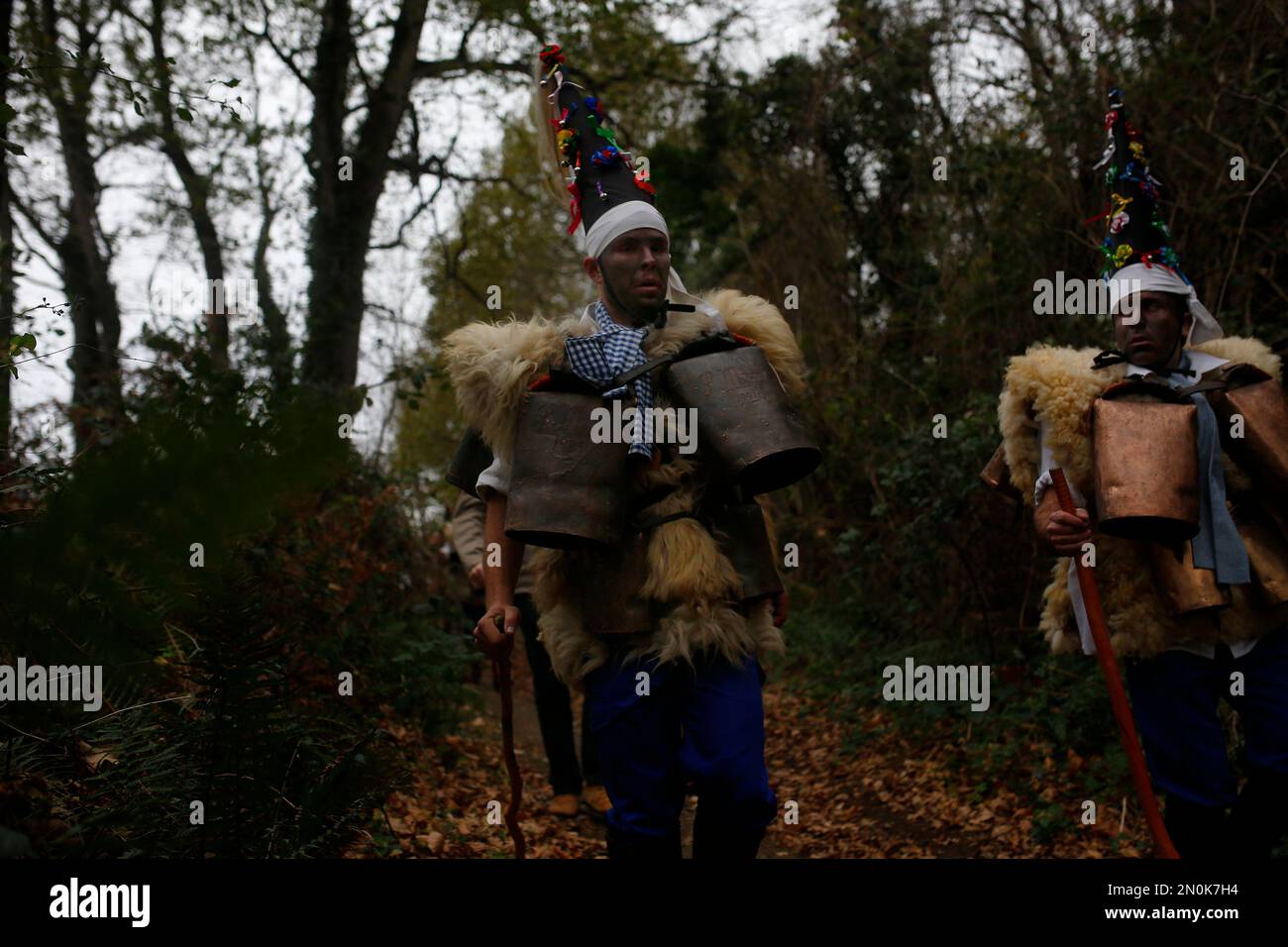 men-dressed-in-sheepskins-and-jingling-bells-to-make-noise-and-so
