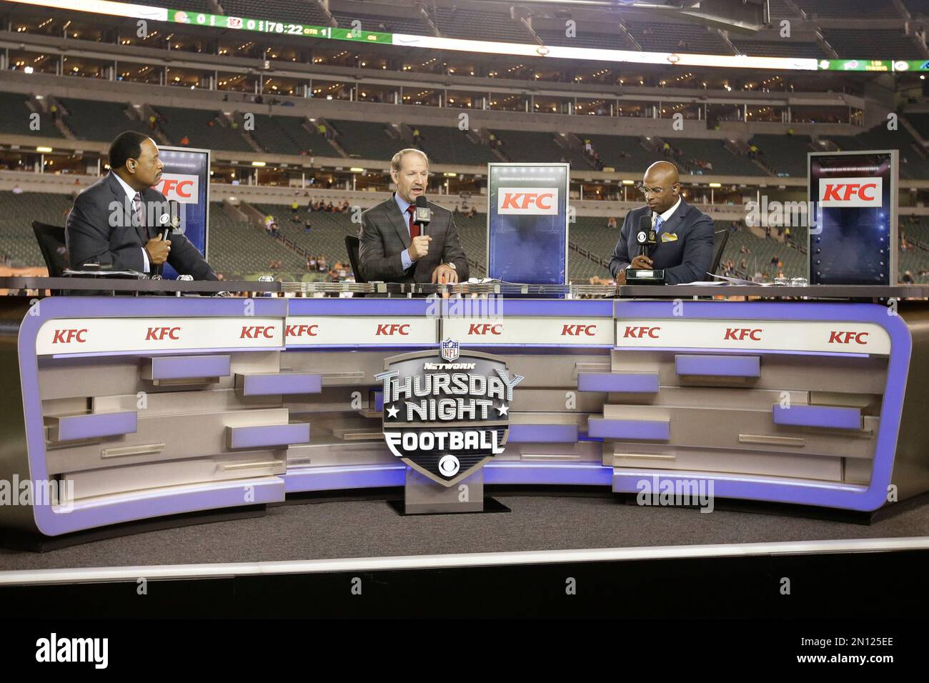 Thursday Night Football announcers, from left, James Brown, Bill Cowher